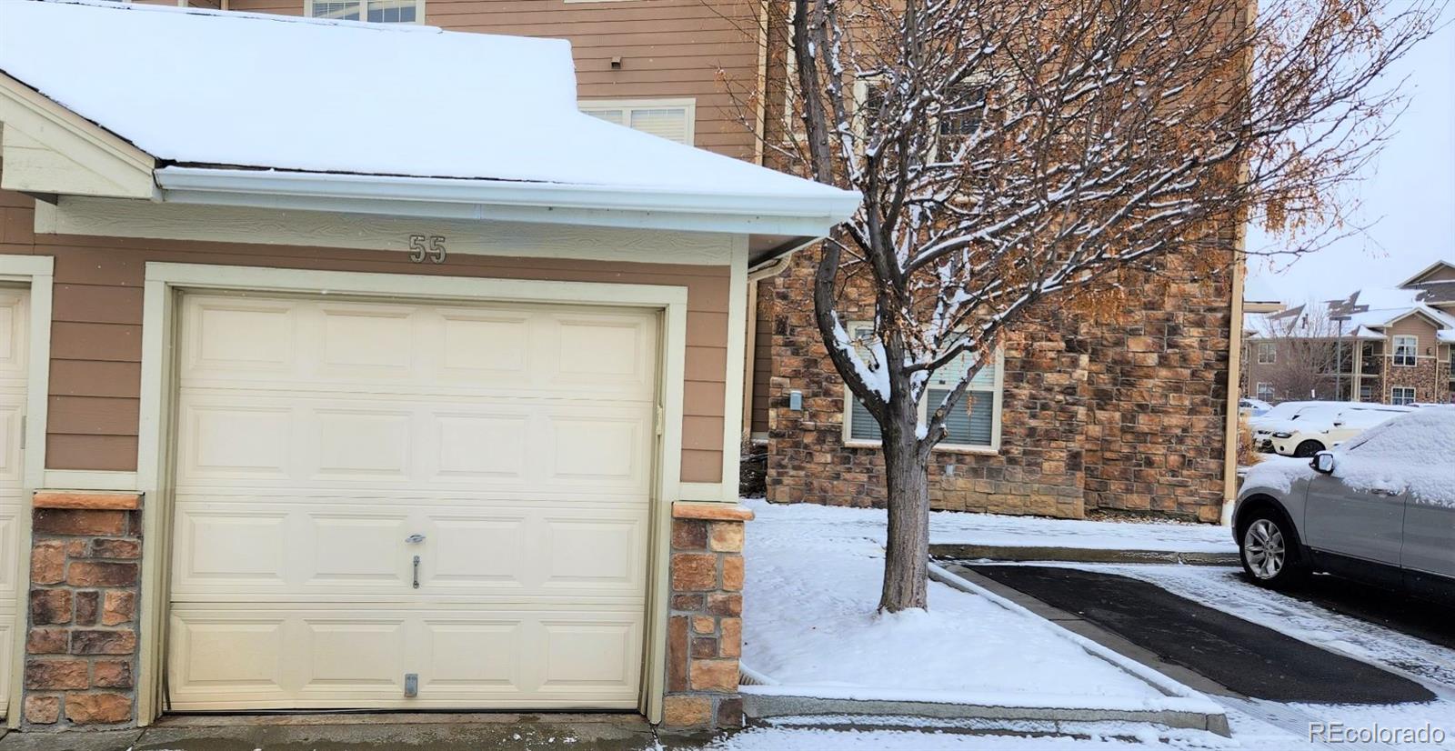 10787 Twenty Mile Road, Unit 305 Parker, CO 80134 - Photo 6 of 28 a white house with a outdoor space