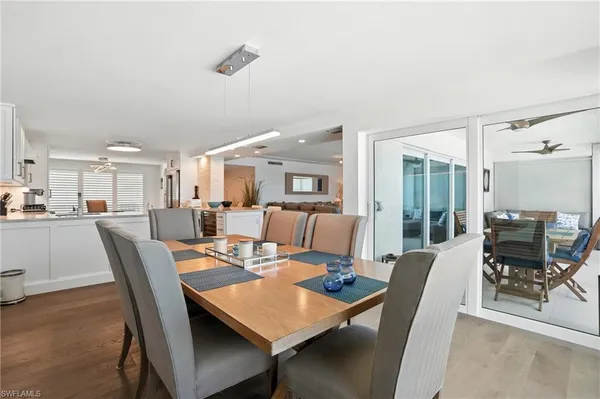 a kitchen with a stove a sink and a refrigerator