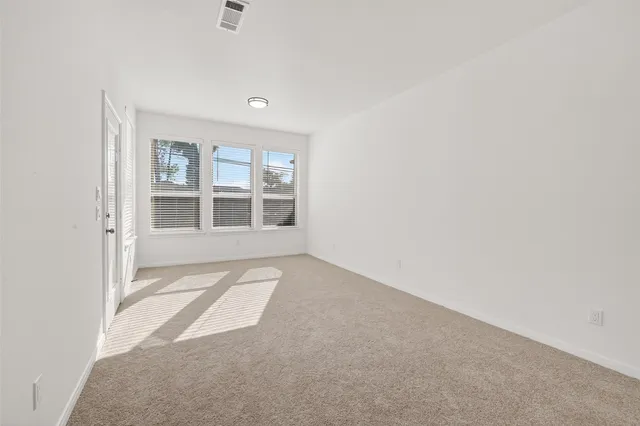 a picture of a bathroom with a shower