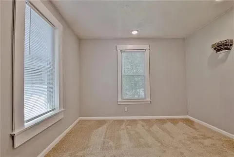 an empty room with windows