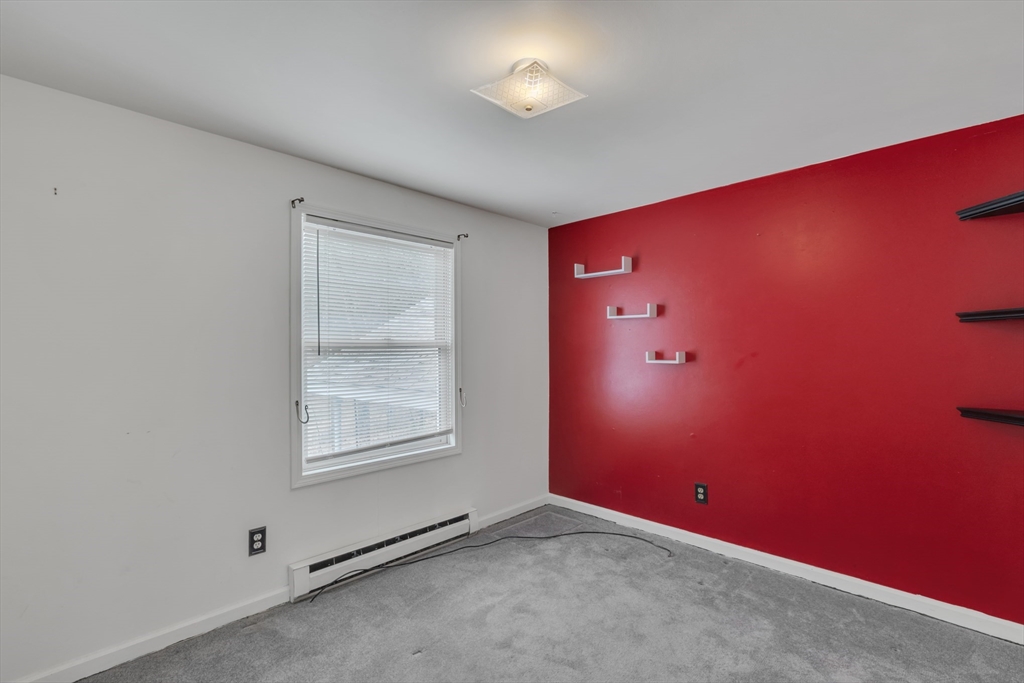 14 Union Road Holland, MA 01521 - Photo 15 of 40 an empty room with windows