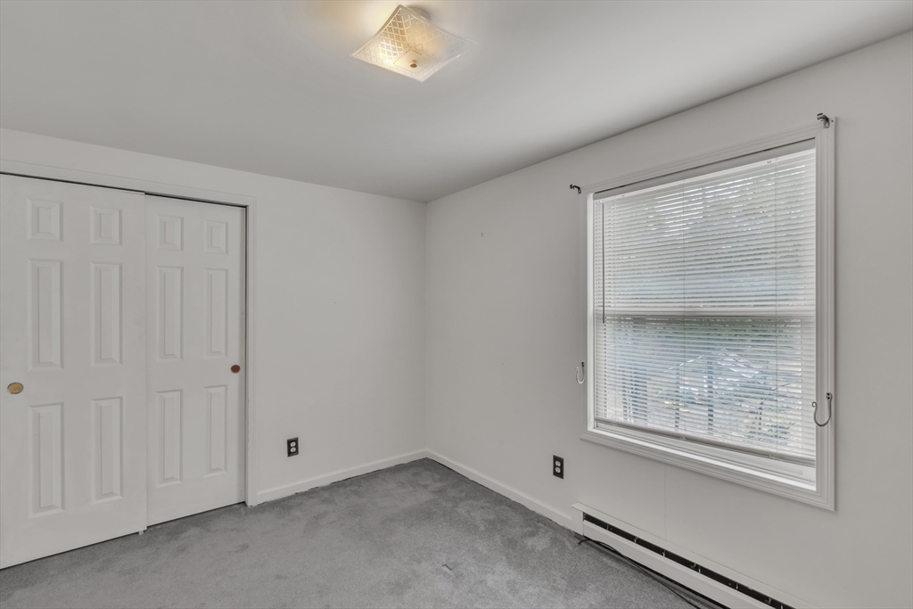 14 Union Road Holland, MA 01521 - Photo 16 of 40 an empty room with a window