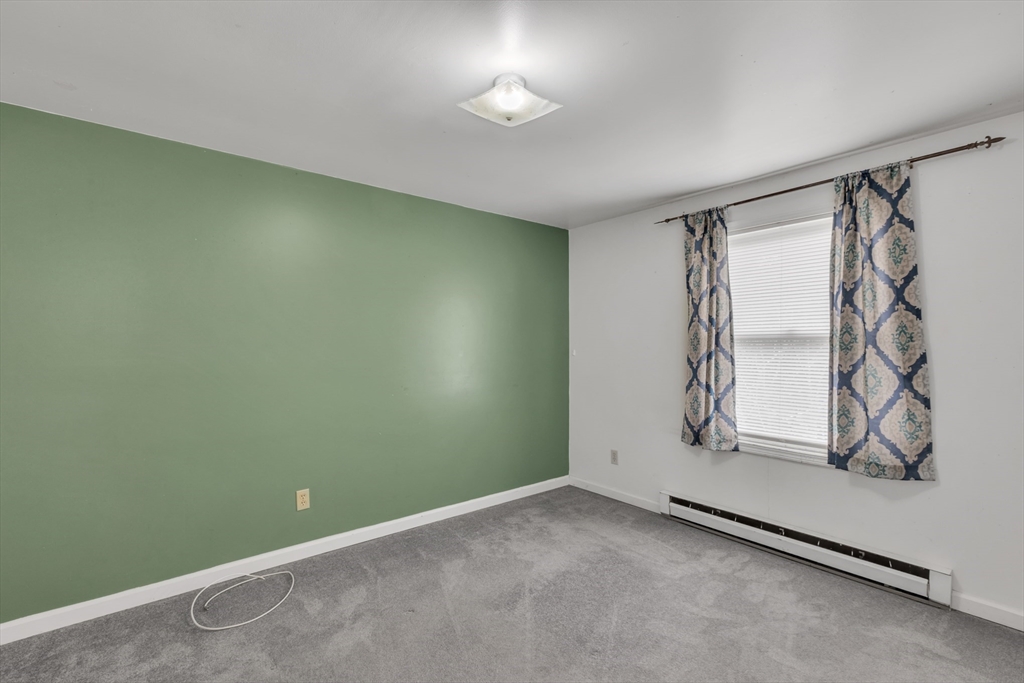 14 Union Road Holland, MA 01521 - Photo 18 of 40 an empty room with a empty space and a window