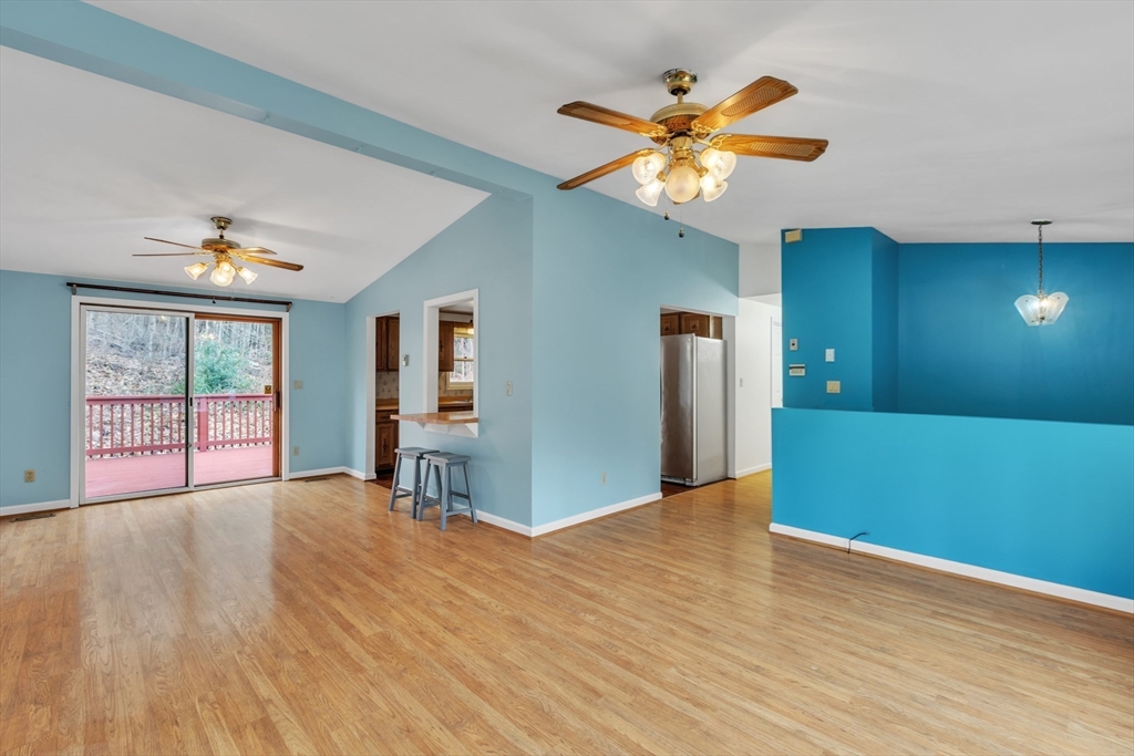 14 Union Road Holland, MA 01521 - Photo 2 of 40 a view of an empty room with window and wooden floor