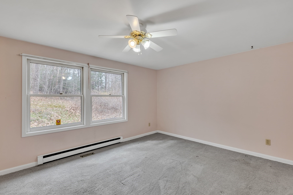14 Union Road Holland, MA 01521 - Photo 22 of 40 a view of an empty room with a window