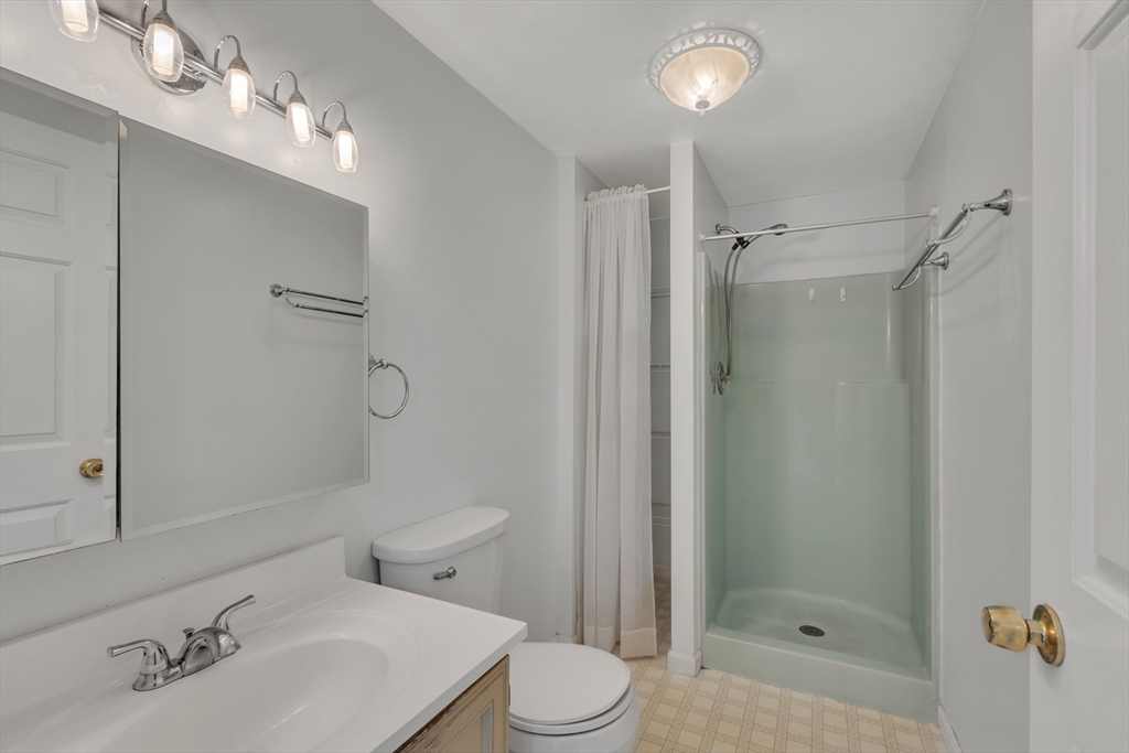 14 Union Road Holland, MA 01521 - Photo 26 of 40 a bathroom with a sink toilet and shower