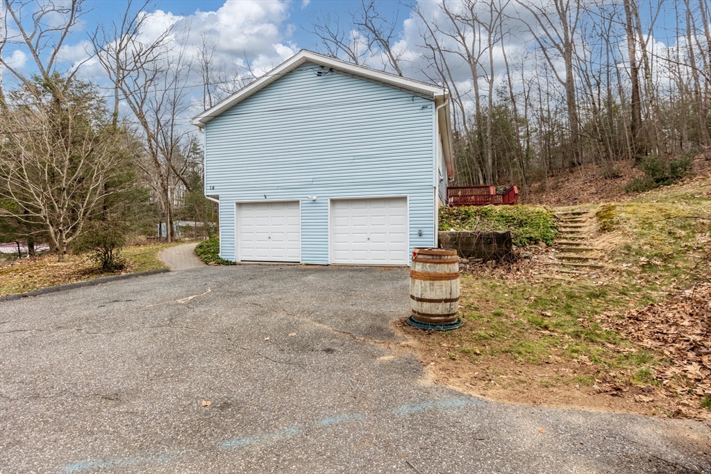 14 Union Road Holland, MA 01521 - Photo 31 of 40 a view of a house with a yard
