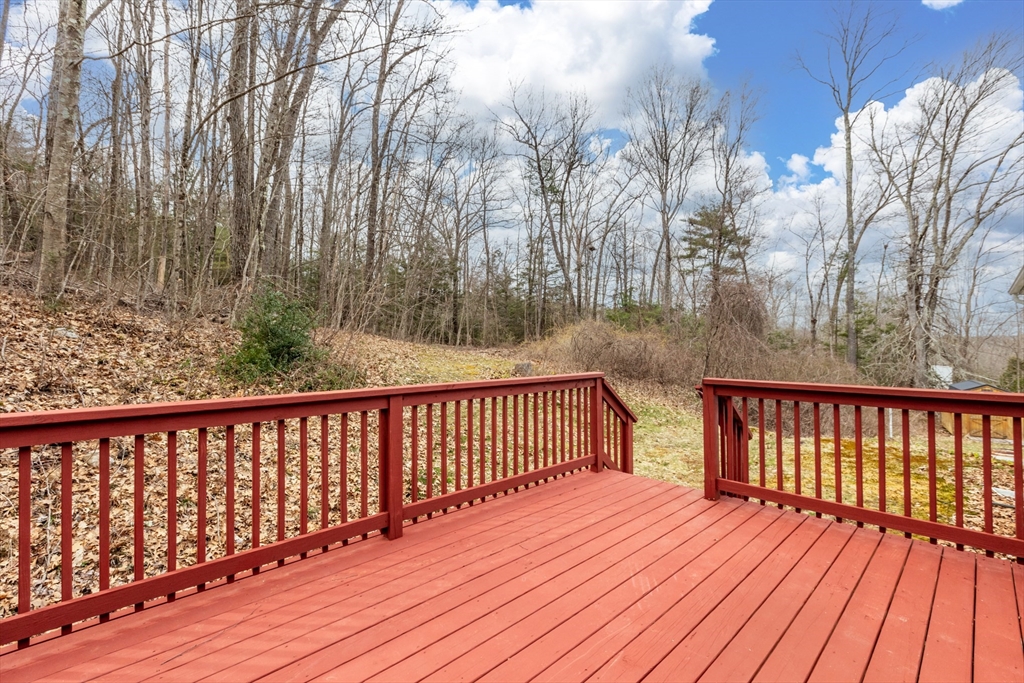 14 Union Road Holland, MA 01521 - Photo 35 of 40 a view of wooden balcony with wooden floor