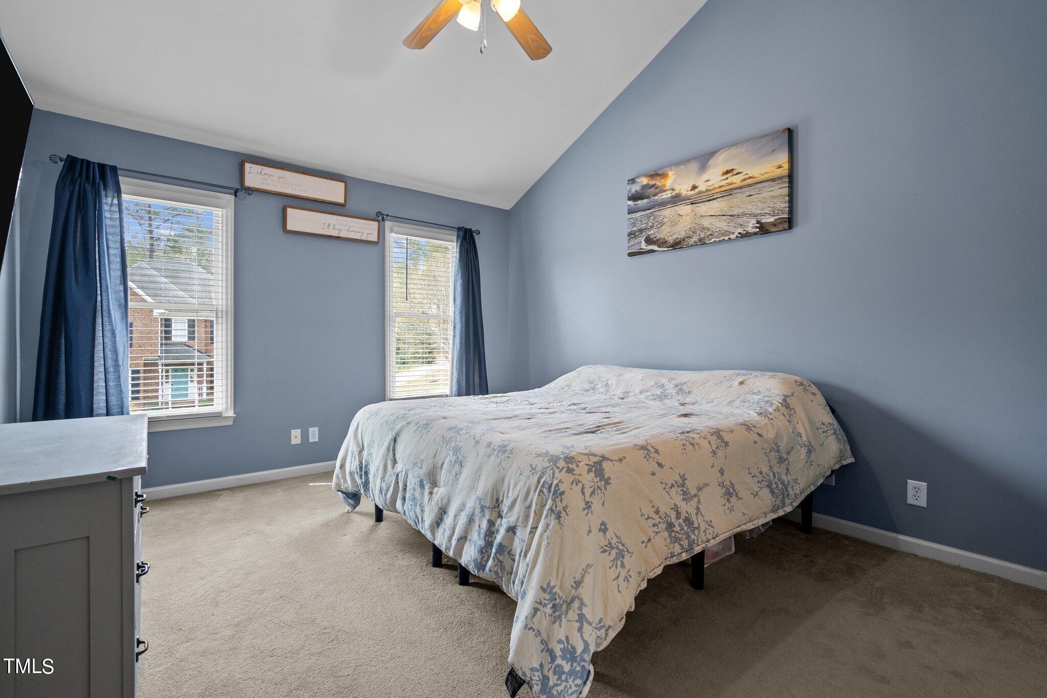 5315 Middleton Road Durham, NC 27713 - Photo 13 of 22 a bed sitting in a bedroom next to a window