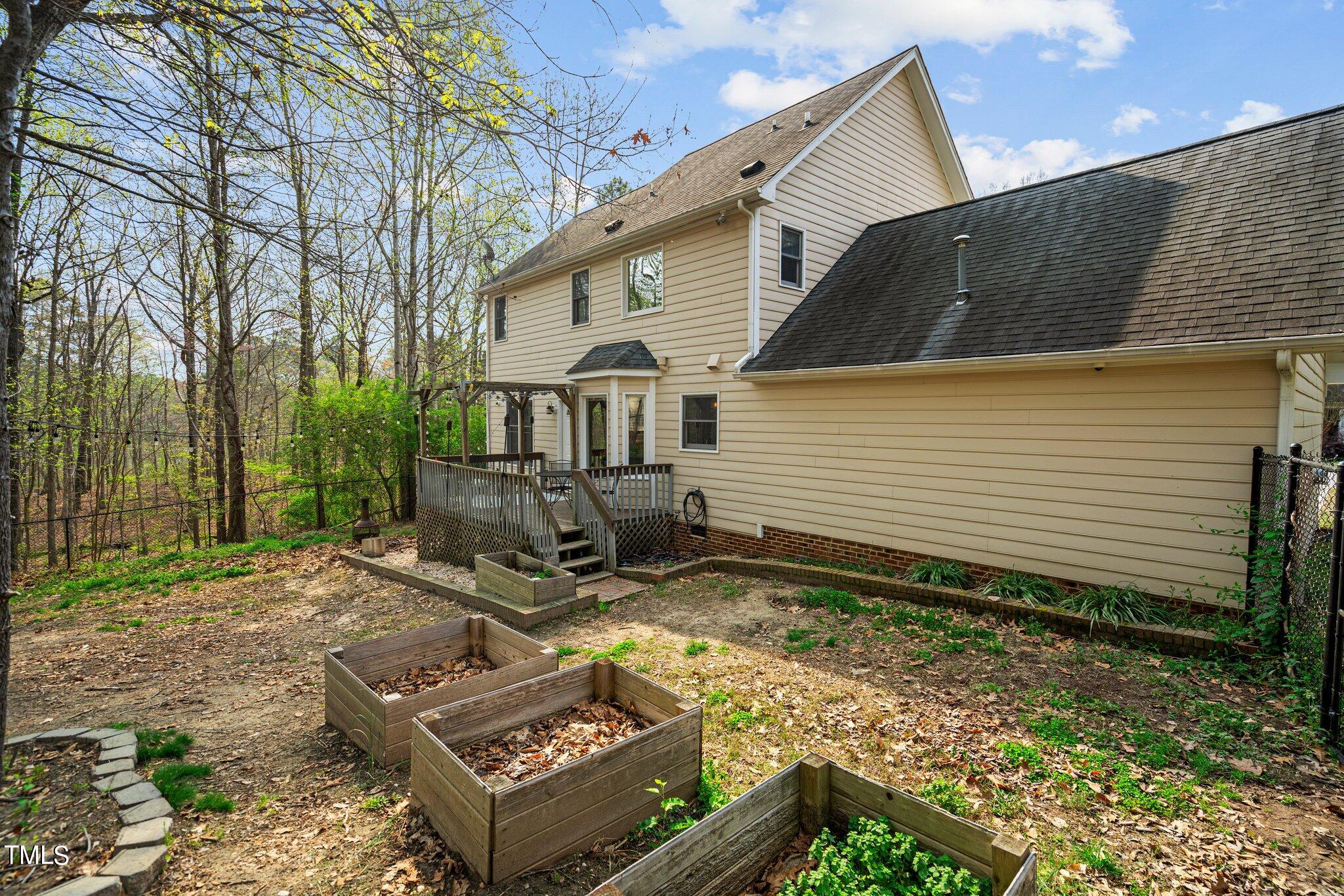 5315 Middleton Road Durham, NC 27713 - Photo 18 of 22 a view of a house with backyard and sitting area
