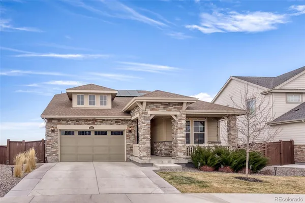 a front view of a house with yard