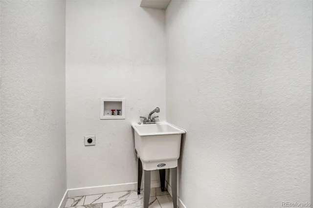 a bathroom with a sink and a toilet