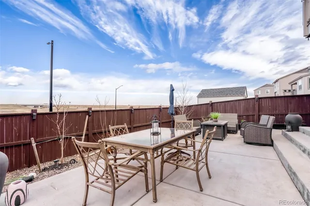 a view of a terrace with chairs