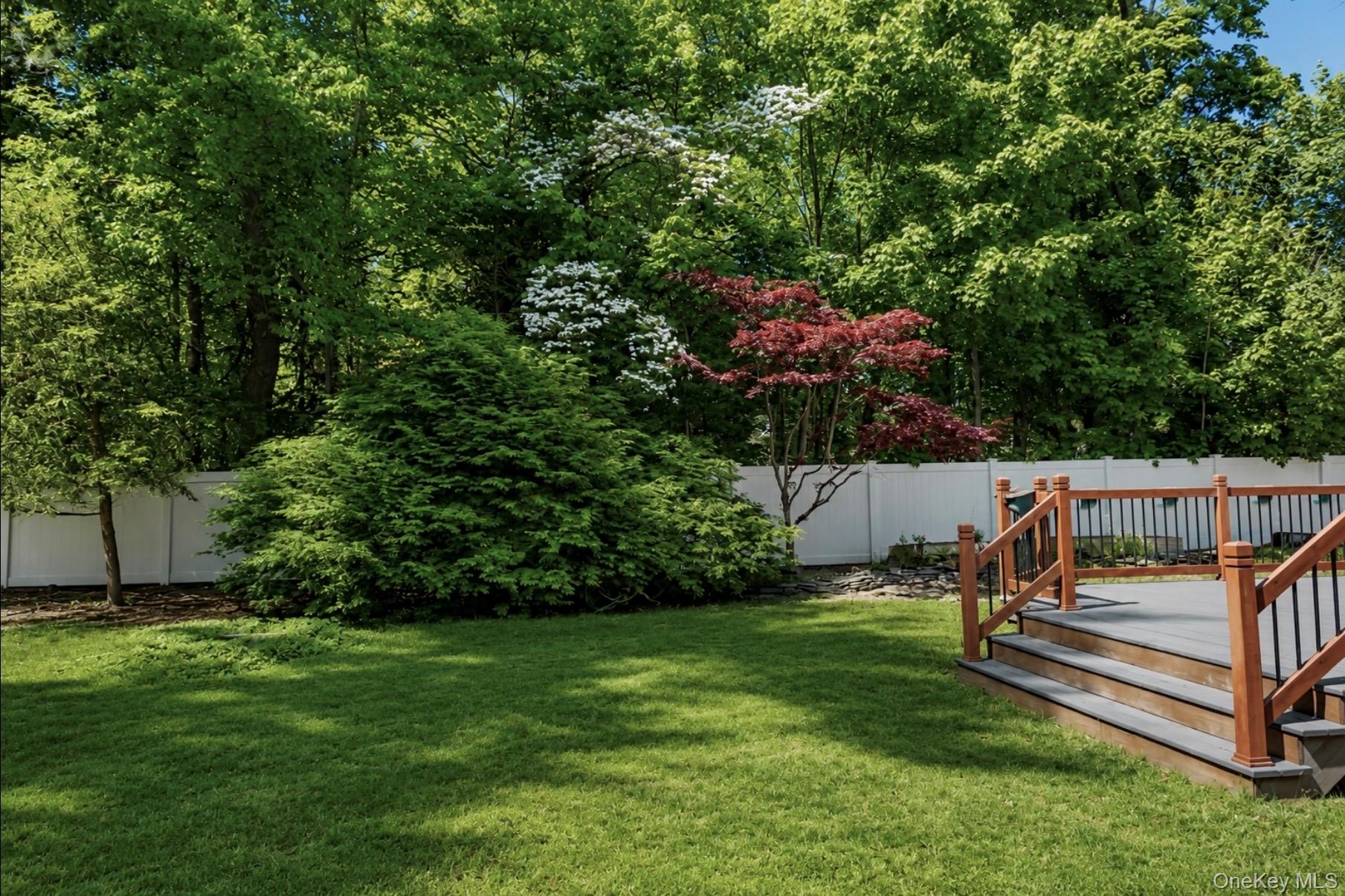 80 Mt Pleasant Road Smithtown, NY 11787 - Photo 20 of 27 a garden view with a seating space