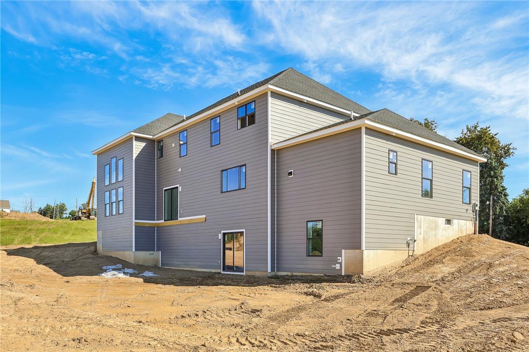 3237 Michaels School Road, Unit 9 Nazareth, PA 18064 - Photo 8 of 56 Clean lines and modern siding define the exterior of this newly constructed multi-level home.