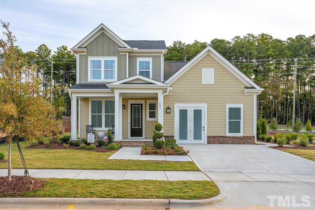 309 Acorn Crossing Way Apex, NC 27539 - Photo 1 of 1 a front view of a house with a yard