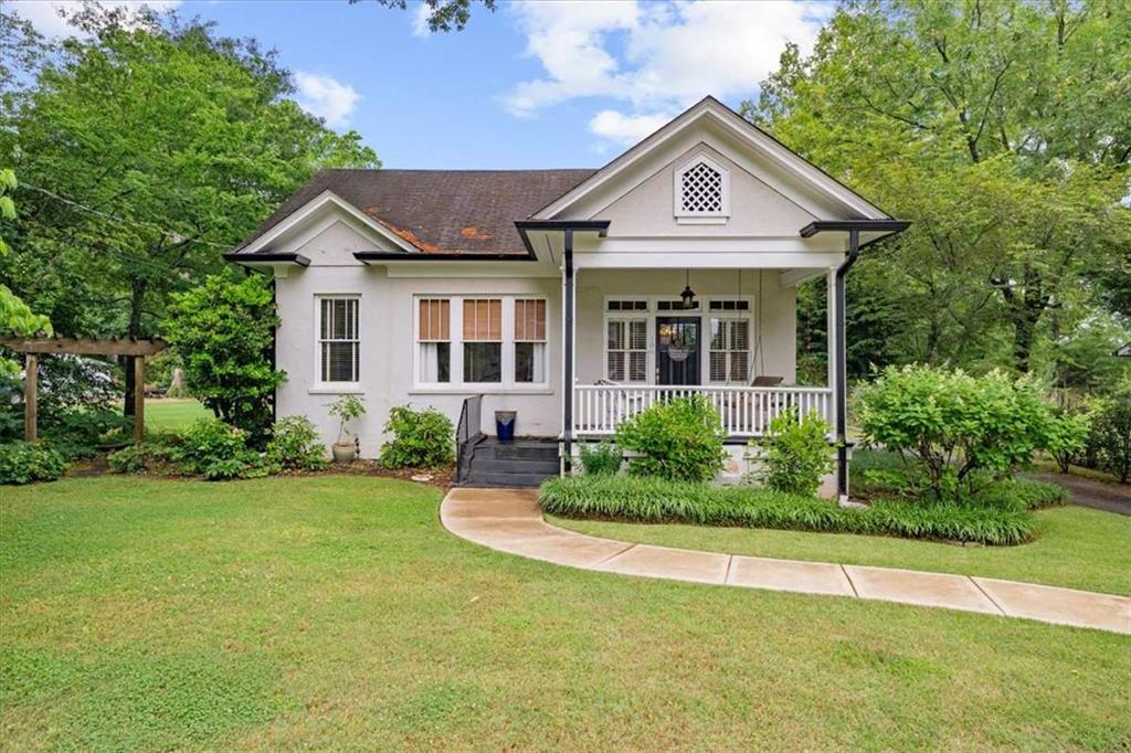 106 Westmore Road Southwest Rome, GA 30165 - Photo 1 of 56 a front view of a house with a yard