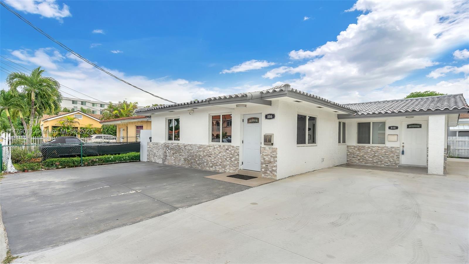 West Flagler Miami, FL 33125 - Photo 12 of 37 a view of a house with a patio