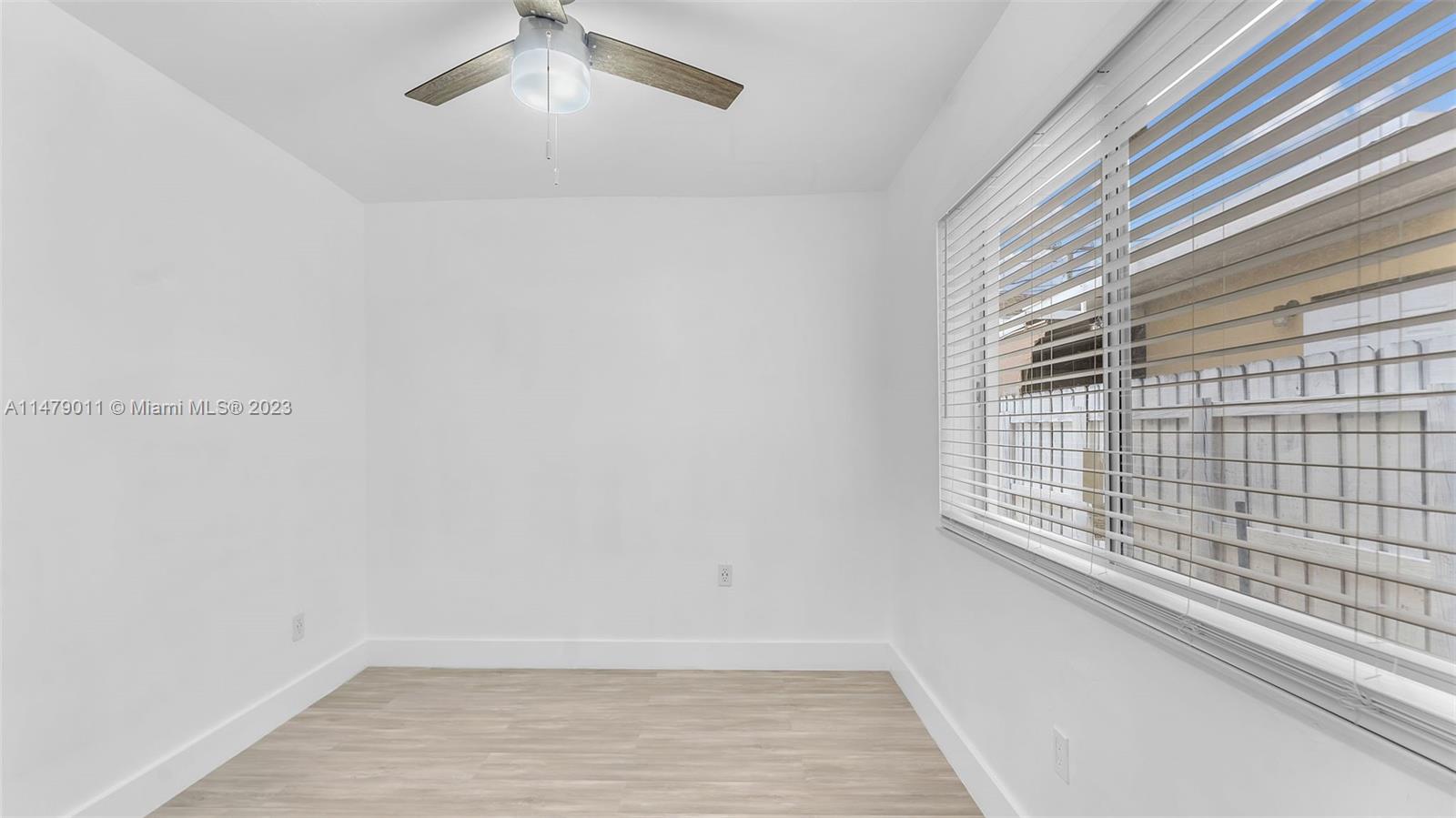 West Flagler Miami, FL 33125 - Photo 17 of 37 a view of an empty room with a window