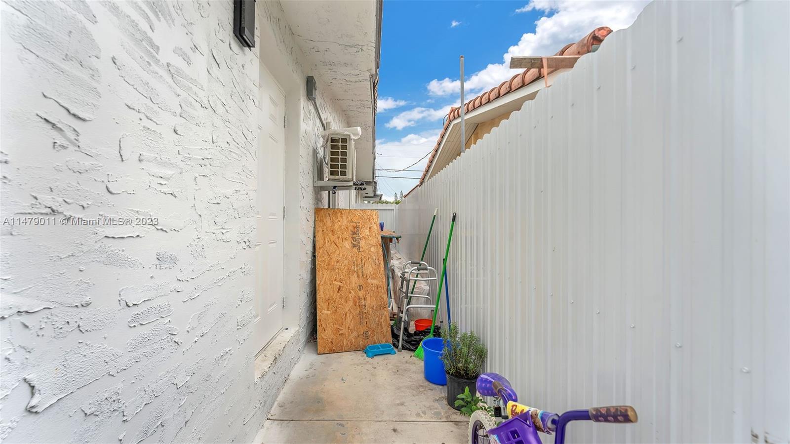 West Flagler Miami, FL 33125 - Photo 31 of 37 a view of entryway with paintings and flowers