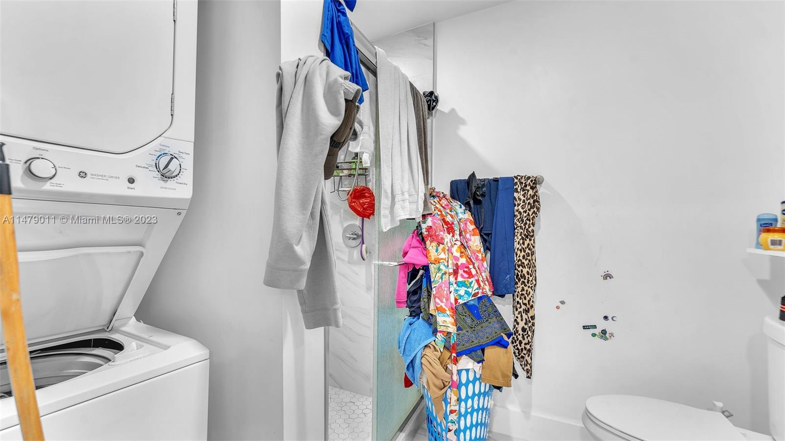 West Flagler Miami, FL 33125 - Photo 34 of 37 a view of a closet with storage