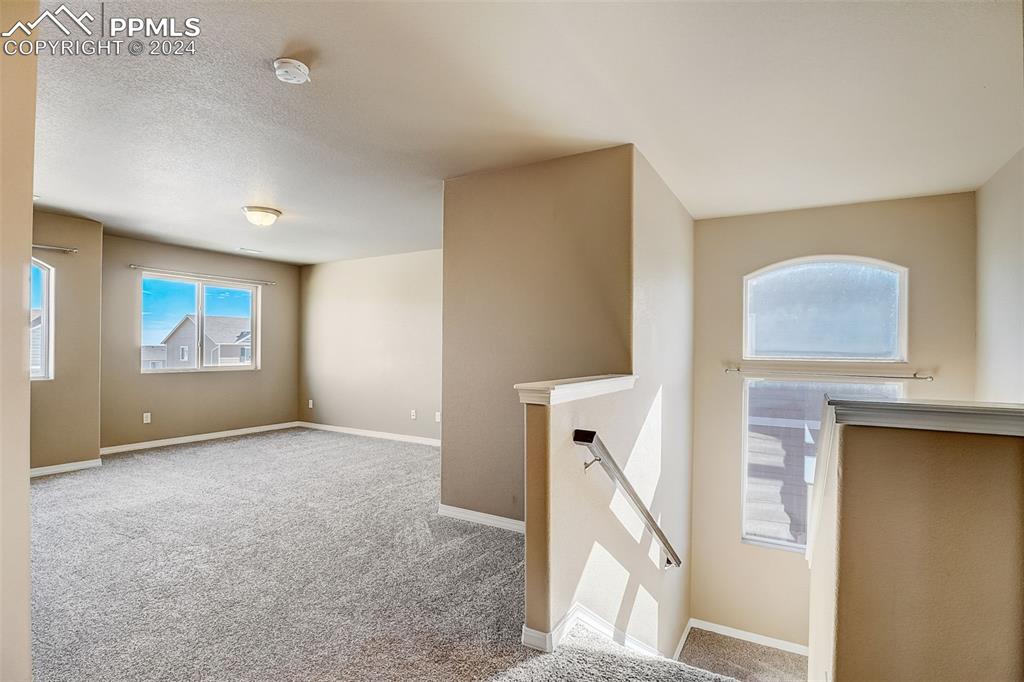11642 Avena Road Peyton, CO 80831 - Photo 18 of 50 a view of an empty room with a window