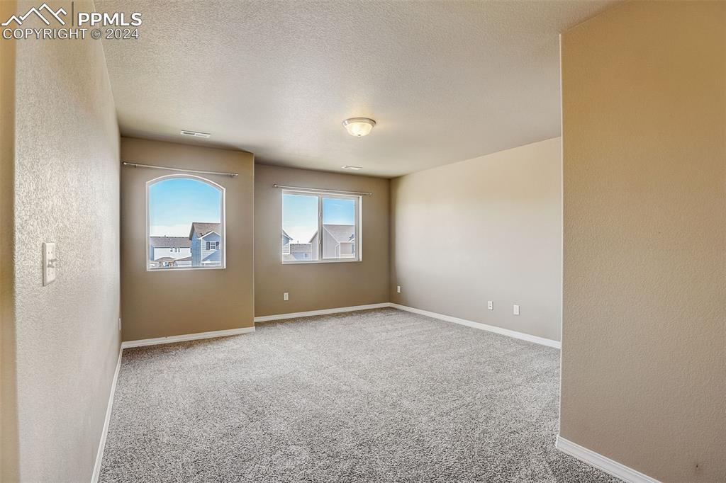 11642 Avena Road Peyton, CO 80831 - Photo 19 of 50 a view of an empty room with a window