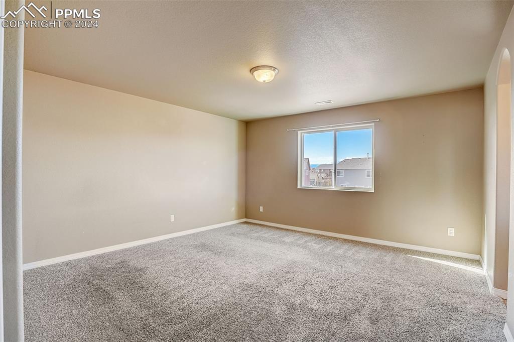 11642 Avena Road Peyton, CO 80831 - Photo 22 of 50 a view of an empty room with a window