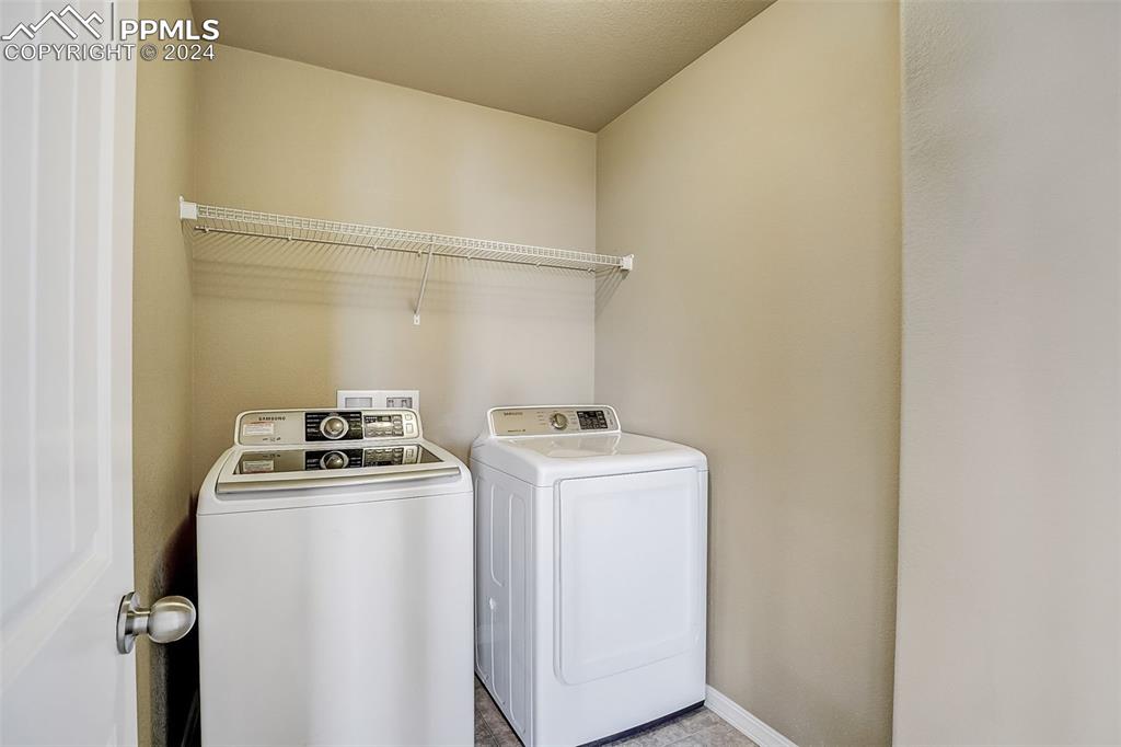 11642 Avena Road Peyton, CO 80831 - Photo 31 of 50 a room with storage and utility