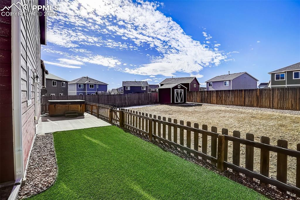 11642 Avena Road Peyton, CO 80831 - Photo 39 of 50 a view of a house with a yard