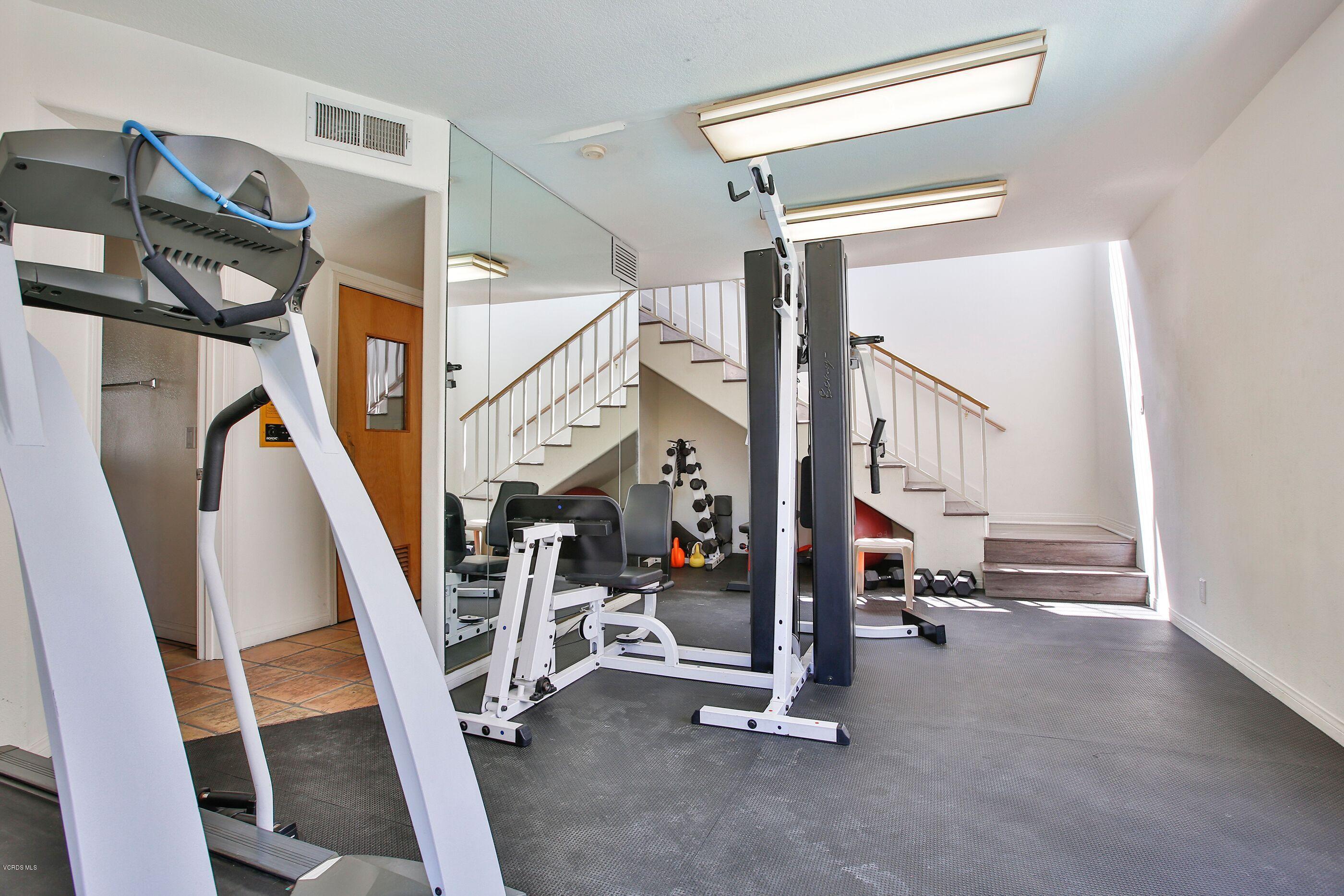 5340 Las Virgenes Road, Unit 11 Calabasas, CA 91302 - Photo 19 of 19 a view of a room with gym equipment