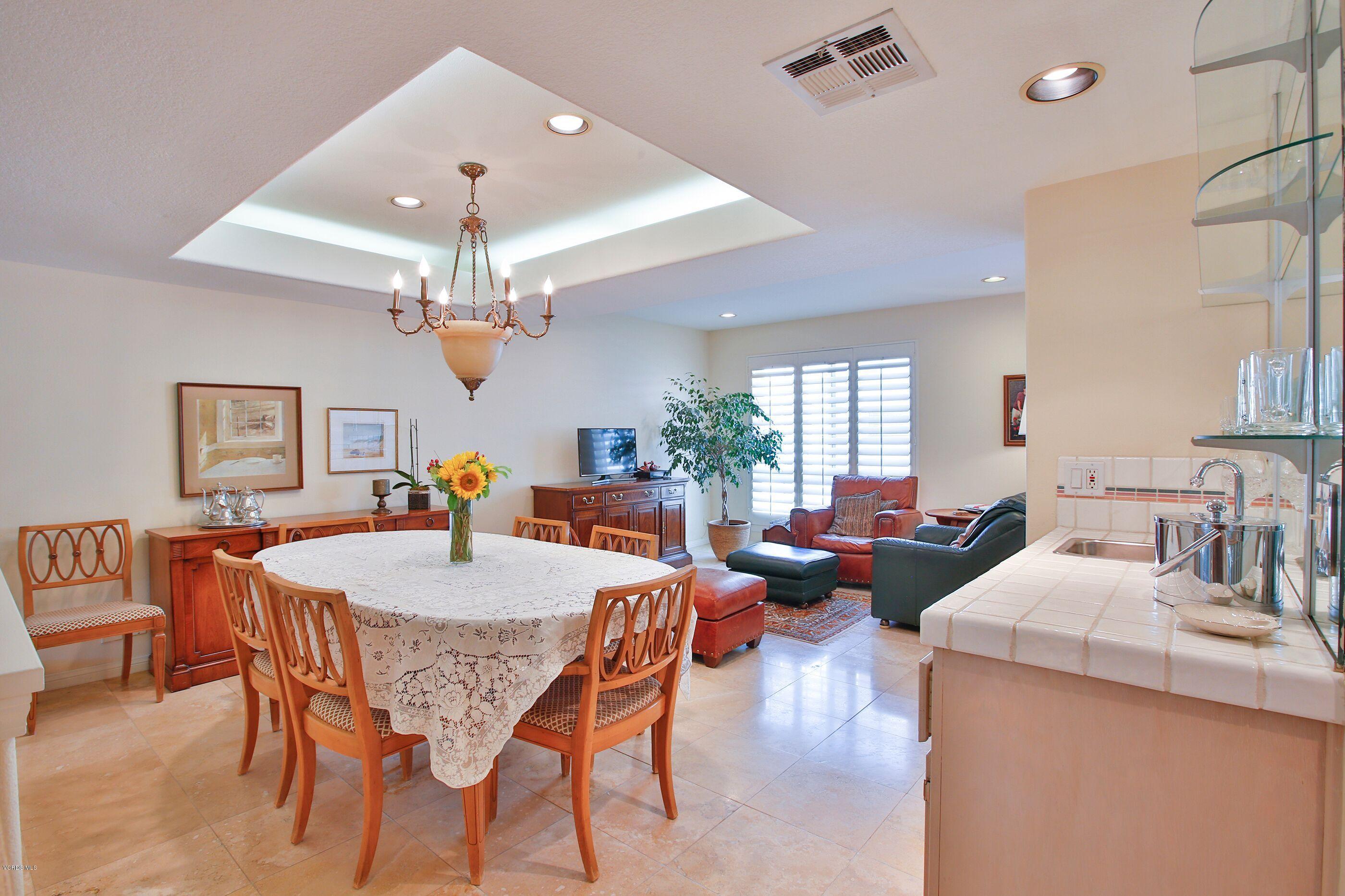 5340 Las Virgenes Road, Unit 11 Calabasas, CA 91302 - Photo 8 of 19 a view of a dining room with furniture window and wooden floor