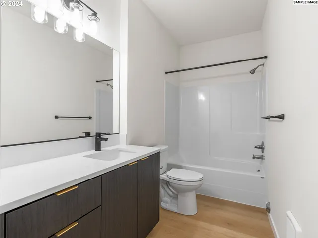 an aerial view of a house with a garden