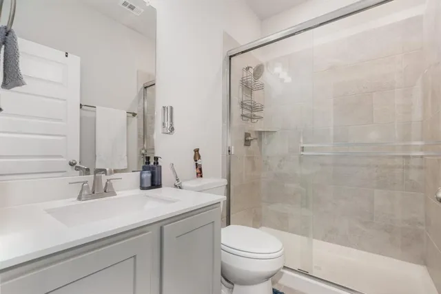 a living room with a couch and a flat screen tv