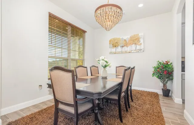 a view of a dining room with furniture
