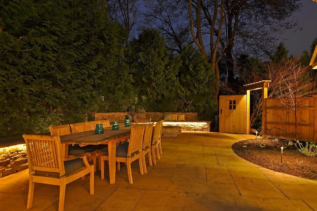 48 Kenilworth Road Wellesley, MA 02482 - Photo 25 of 30 a view of a swimming pool with a patio