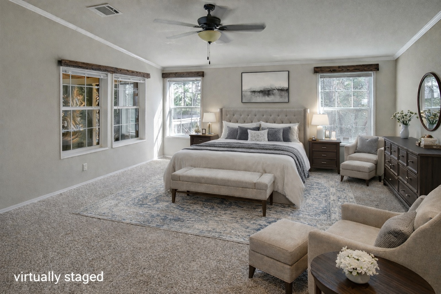 1024 Sand Hills Road Red Rock, TX 78662 - Photo 9 of 37 This spacious room features neutral-toned carpet, a ceiling fan, and multiple windows allowing for natural light
