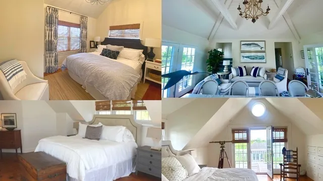 a bed room with a bed mirror and couch