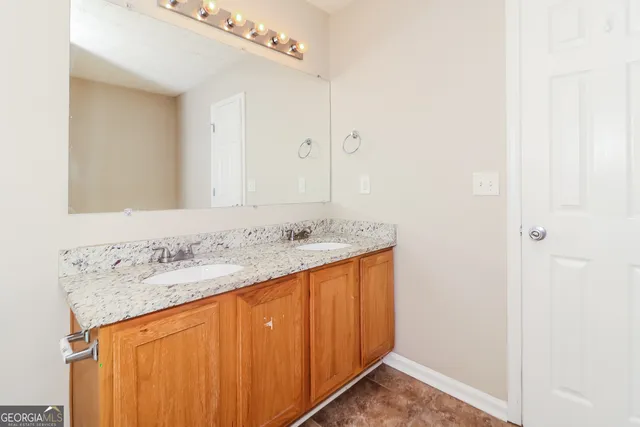 an empty room with windows and window