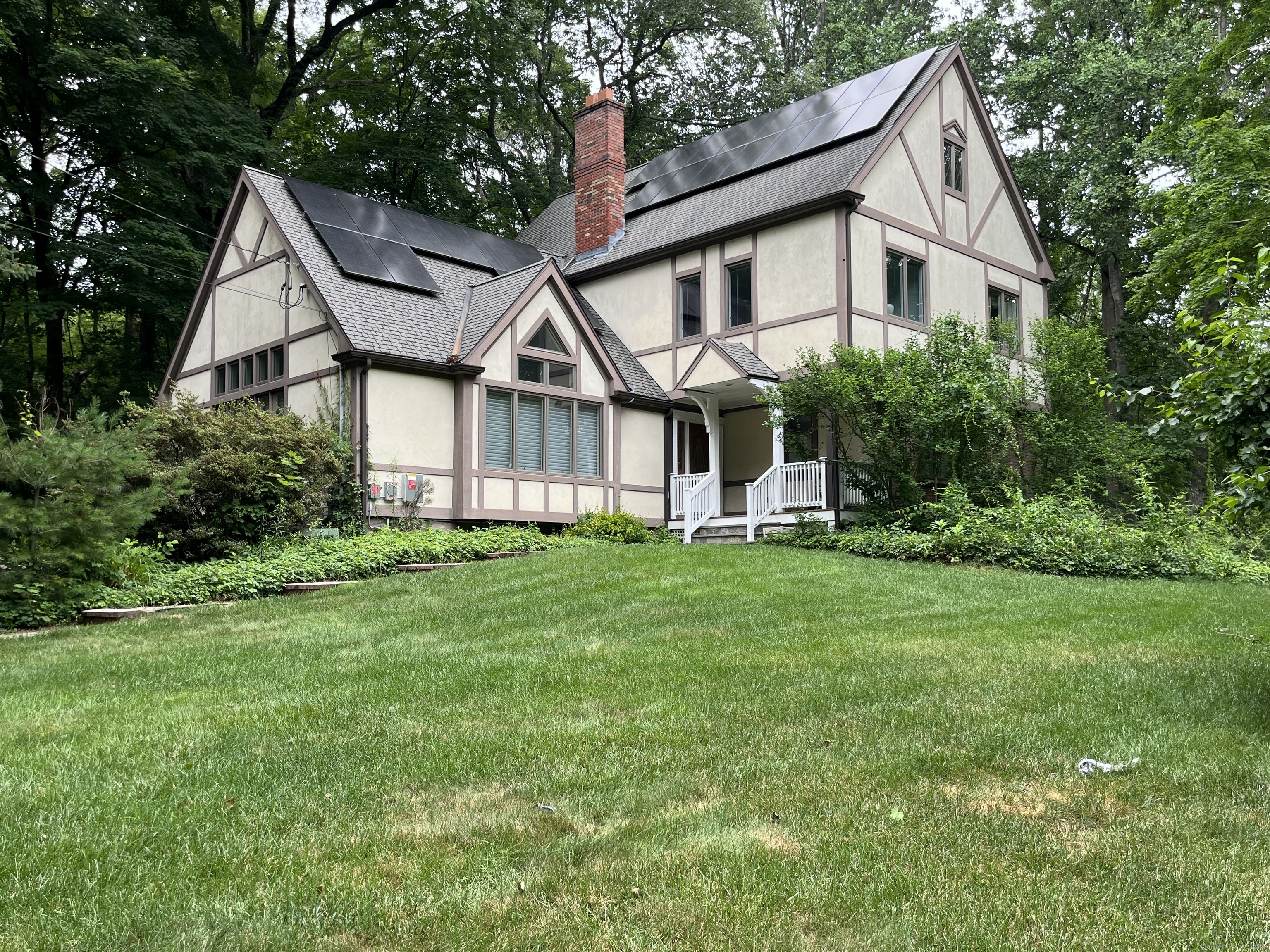 305 Rimmon Road Woodbridge, CT 06525 - Photo 2 of 28 a view of a yard in front of house