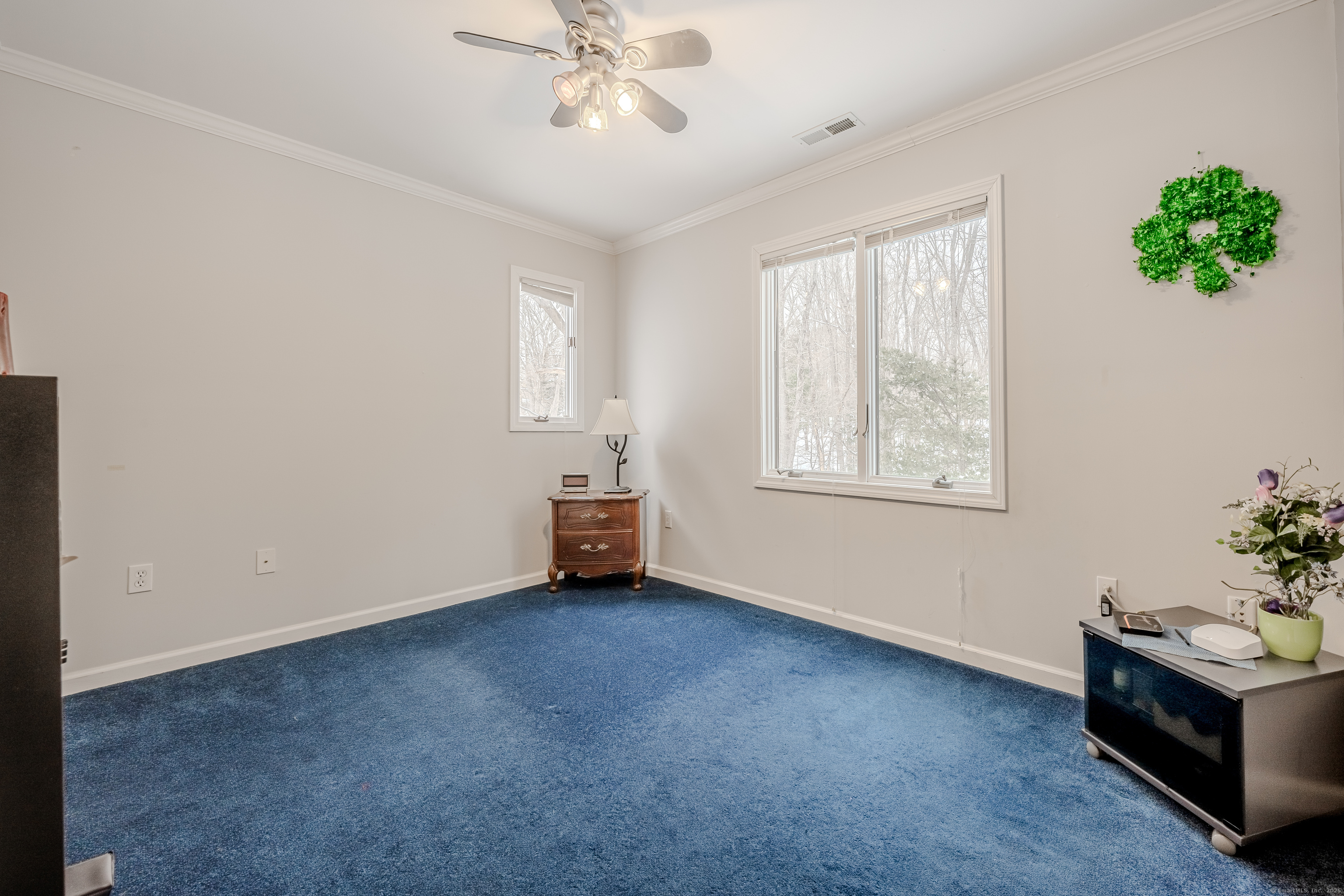 305 Rimmon Road Woodbridge, CT 06525 - Photo 21 of 28 a view of an empty room with a window