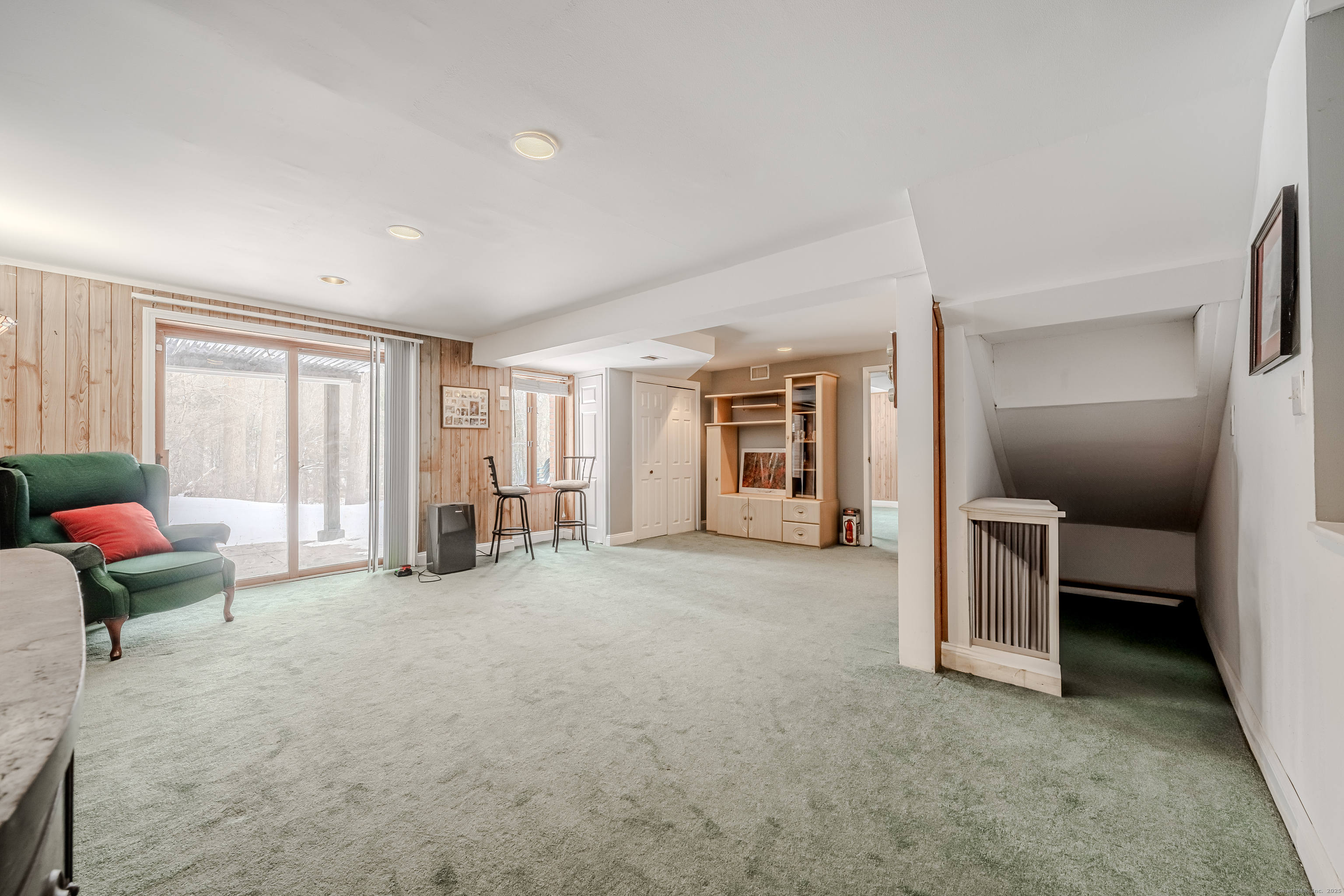 305 Rimmon Road Woodbridge, CT 06525 - Photo 25 of 28 a big room with furniture and windows