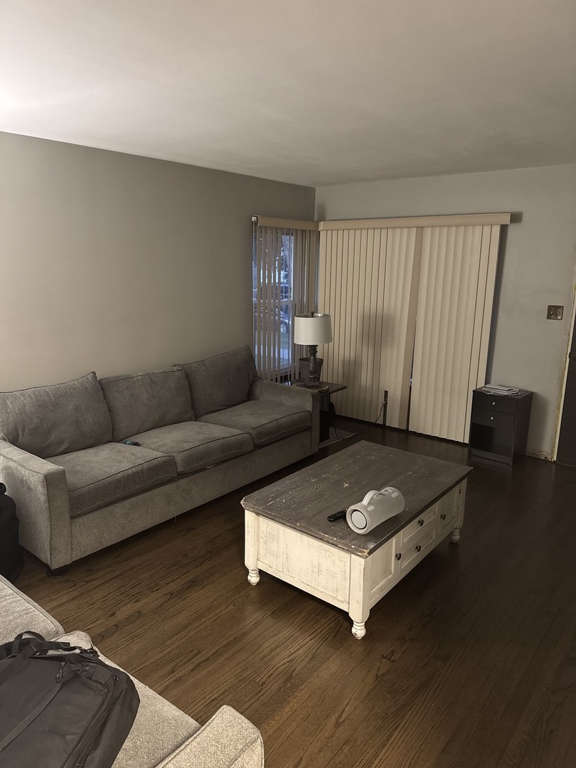 3314 South 58th Avenue Cicero, IL 60804 - Photo 12 of 13 a living room with furniture and a window