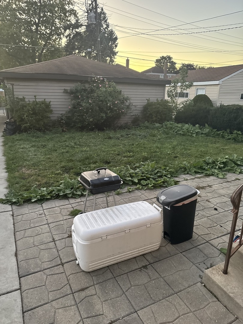 3314 South 58th Avenue Cicero, IL 60804 - Photo 3 of 13 a view of a lake with table and chairs