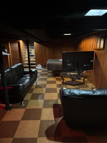 a room with furniture and flowers