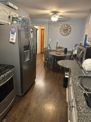 a room with table and chairs