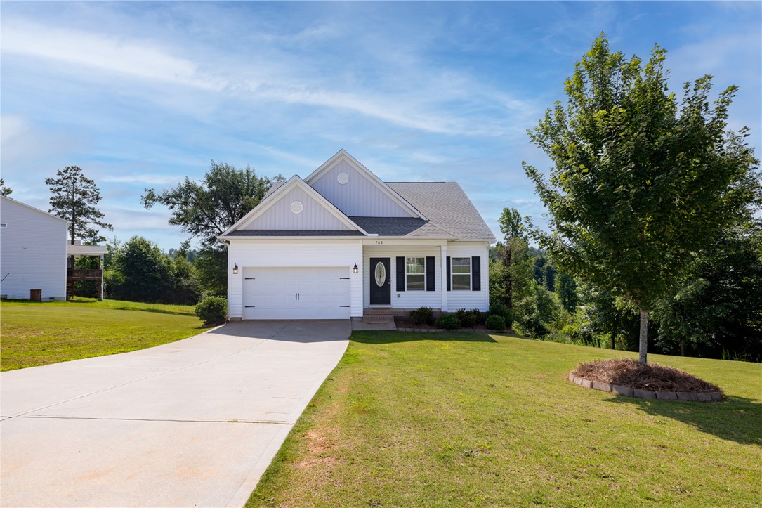 768 Rocky Ridge Circle Seneca, SC 29678 - Photo 1 of 30 A well-maintained residence with a manicured lawn and a convenient driveway.