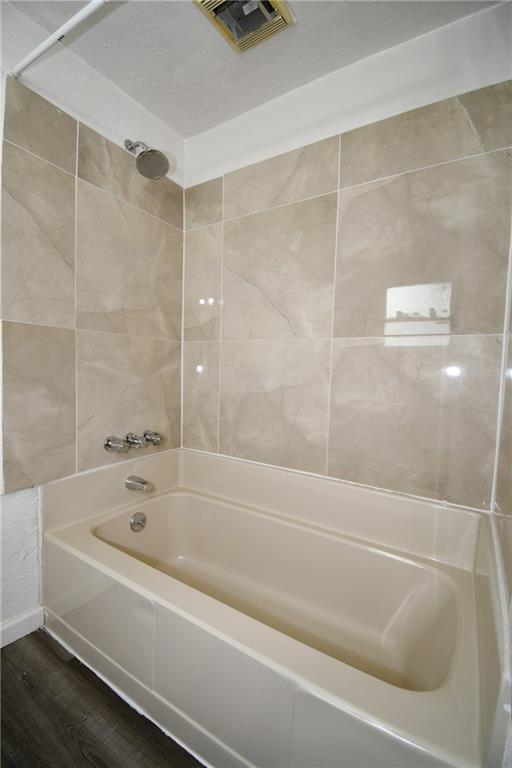 126 Rinne Street Pittsburgh, PA 15210 - Photo 17 of 24 a bathroom with a shower and bathtub
