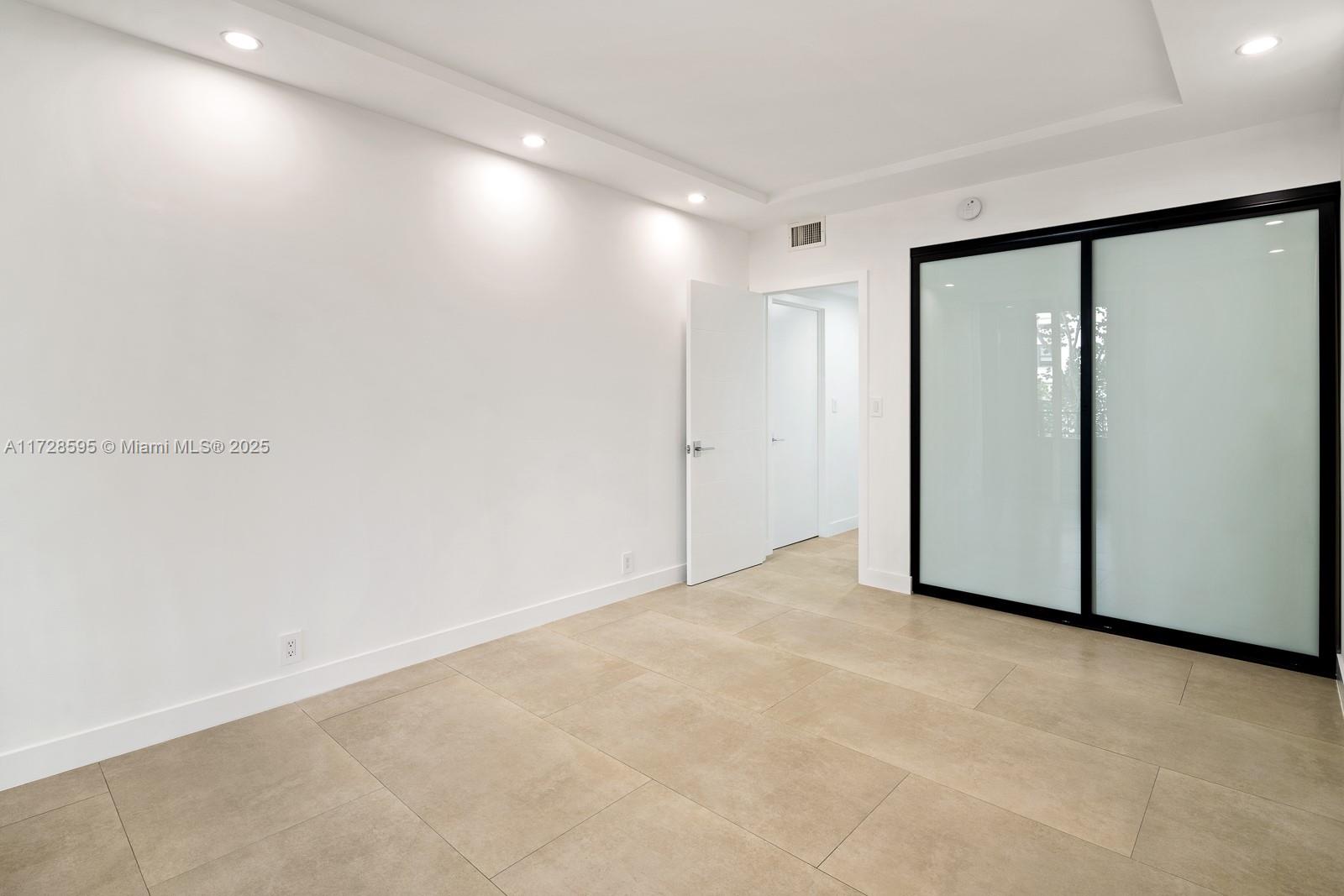 141 Crandon Boulevard, Unit 229 Key Biscayne, FL 33149 - Photo 17 of 30 a view of an empty room