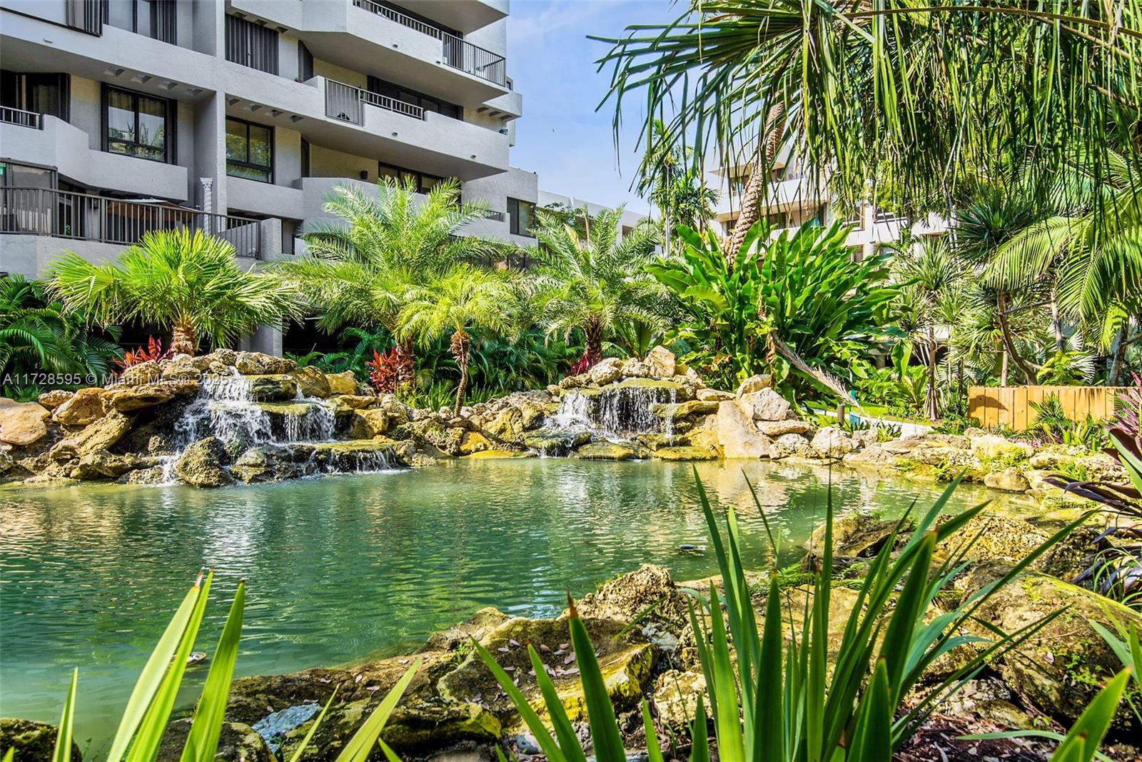 141 Crandon Boulevard, Unit 229 Key Biscayne, FL 33149 - Photo 23 of 30 a view of residential houses with yard